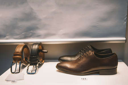 Men shoes in a luxury shop in Parisの写真素材