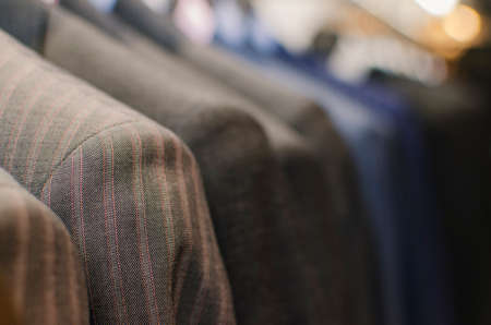 Men suits on racksの写真素材