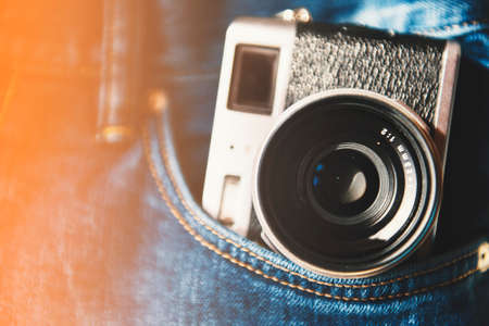 Vintage camera in a pocket.