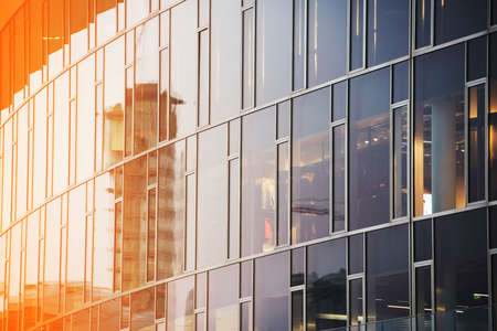 Business building glass with sun flareの写真素材