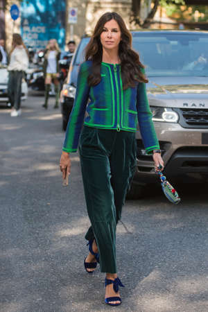 Milan, Italy - September 22, 2017: Beautiful girls outside fashion shows during Milan Fashion Week.のeditorial素材