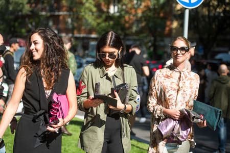 Milan, Italy - September 22, 2017: Beautiful girls outside fashion shows during Milan Fashion Week.のeditorial素材
