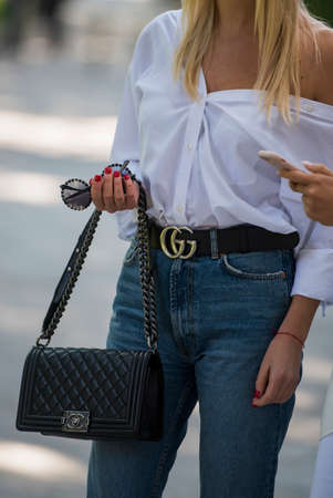 Milan, Italy - September 22, 2017: Fashionista with Gucci handbag outside a fashion show during Milan Fashion Week.のeditorial素材