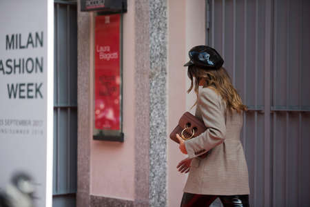 Milan, Italy - September 24, 2017: Fashion girl during Milan Fashion Week.のeditorial素材