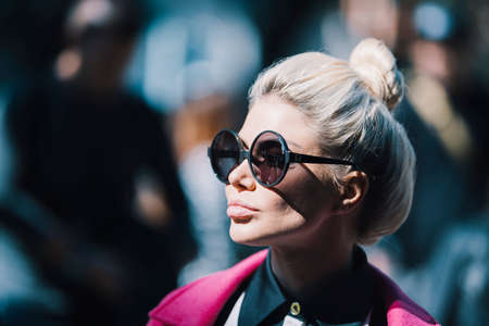 Milan, Italy - September 22, 2017: Fashionable girl portrait during Milano Fashion Weekのeditorial素材