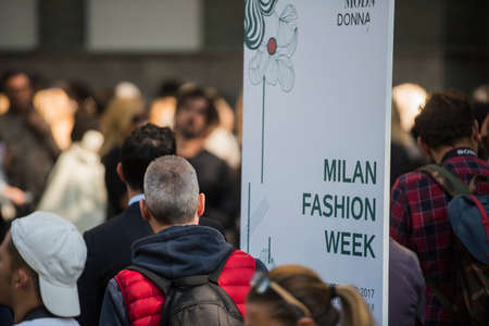 Milan, Italy - September 22, 2017: People at the entrance of a fashion show during Milano Fashion Week.のeditorial素材