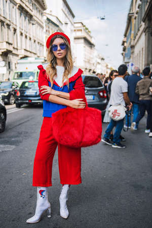 Milan, Italy - September 23, 2017: Fashion girl posing on the street during Milan Fashion Week.のeditorial素材