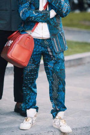 Milan, Italy - September 22, 2017: Street style concept - people with fashionable looks during Milan Fashion Week.のeditorial素材