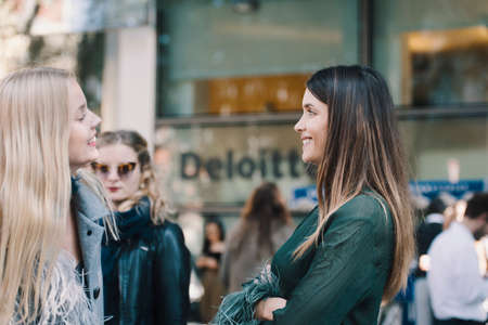 Milan, Italy - September 22, 2018: Fashionable girls on the street during Milan Fashion Week.のeditorial素材