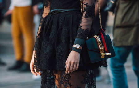 Milan, Italy - September 22, 2018: Girl with a Gucci purse durin Milan Fashion Week shows.のeditorial素材