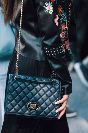 Milan, Italy - September 22, 2017: Street style concept - people with fashionable looks during Milan Fashion Week.のeditorial素材