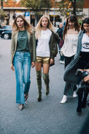 Milan, Italy - September 22, 2018: Fashionable girls on the street during Milan Fashion Week.のeditorial素材