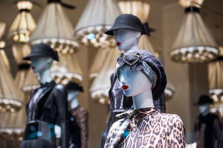 Women elegant clothing in a fashion store in Milan.の写真素材