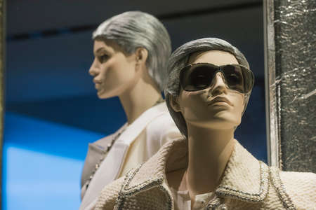 Women clothing on mannequins in a store in milanの写真素材