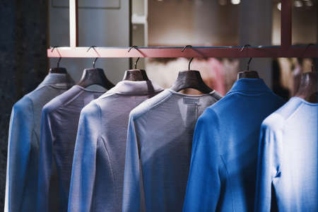 Clothing on racks in a store in Veniceの写真素材