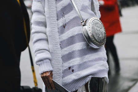 Paris, France - March 01, 2019: Street style outfit -  Balmain purse in detail before a fashion show...