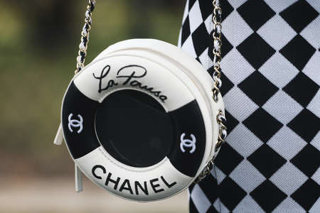 Paris, France - March 01, 2019: Street style outfit -  Chanel purse in detail after a fashion show...