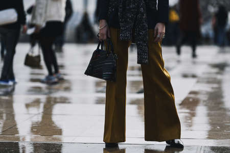 Paris, France - March 02, 2019: Street style â€“ Street style outfit before a fashion show...