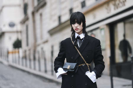 Paris, France - March 02, 2019: Street style outfit -  before a fashion show during Paris Fashion...
