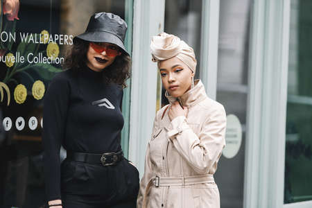 Paris, France - March 03, 2019: Street style outfits during Paris Fashion Week - PFWFW19