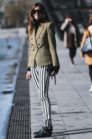 Paris, France - March 04, 2019: Street style outfit -  Fashionable person after a fashion show during Paris Fashion Week - PFWFW19のeditorial素材