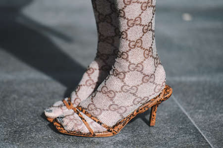 Paris, France - March 04, 2019: Street style outfit -  Grey Tights, Shoes by Gucci in detailafter a fashion show during Paris Fashion Week - PFWFW19のeditorial素材