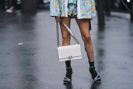 Paris, France - March 5, 2019: Street style outfit before a fashion show during Paris Fashion Week -...