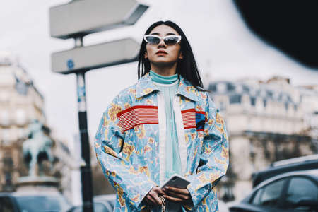 Paris, France - March 5, 2019: Street style outfit before a fashion show during Paris Fashion Week -...