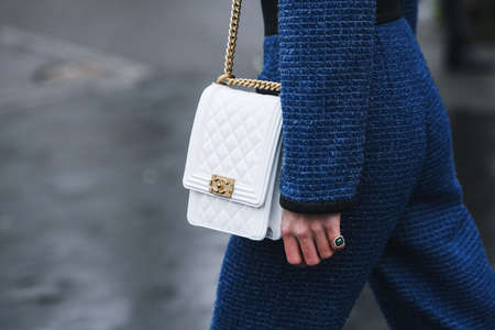 Paris, France - March 05, 2019: Street style outfit -  Woman wearing Chanel purse after a fashion show during Paris Fashion Week - PFWFW19のeditorial素材