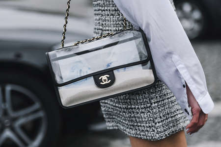 Paris, France - March 05, 2019: Street style outfit -  Woman wearing Chanel purse after a fashion show during Paris Fashion Week - PFWFW19のeditorial素材