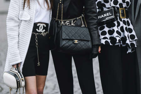 Paris, France - March 05, 2019: Street style outfit -  Woman wearing Chanel purse after a fashion show during Paris Fashion Week - PFWFW19のeditorial素材