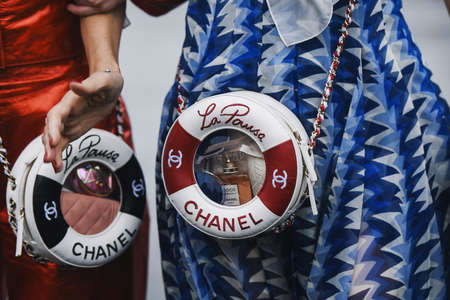 Paris, France - March 05, 2019: Street style outfit -  Woman wearing Chanel purse after a fashion show during Paris Fashion Week - PFWFW19のeditorial素材