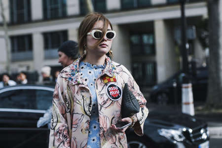 Paris, France - March 05, 2019: Street style appearance during Paris Fashion Week - PFWFW19