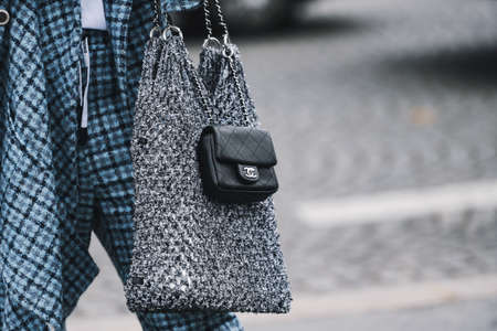 Paris, France - March 05, 2019: Street style outfit -  Woman wearing Chanel purse after a fashion show during Paris Fashion Week - PFWFW19のeditorial素材