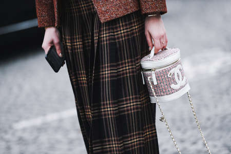 Paris, France - March 05, 2019: Street style outfit -  Woman wearing Chanel purse after a fashion show during Paris Fashion Week - PFWFW19のeditorial素材
