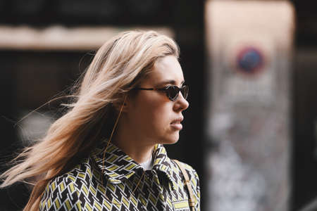 Milan, Italy - February 20, 2019: Street style outfit before a fashion show during Milan Fashion...