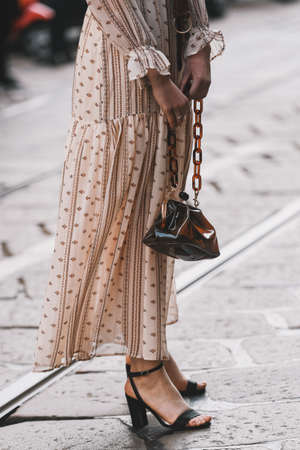 Milan, Italy - February 20, 2019: Street style outfits - models, bloggers and influencers before a fashion show during Milan Fashion Week - MFWFW19のeditorial素材