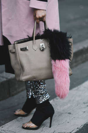 Milan, Italy - February 20, 2019: Street style outfits - models, bloggers and influencers before a fashion show during Milan Fashion Week - MFWFW19のeditorial素材