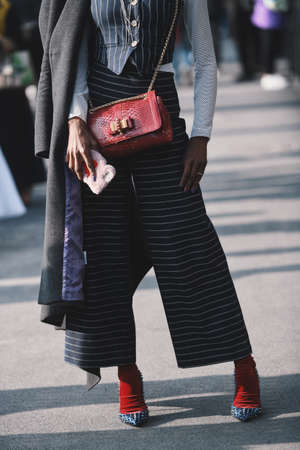 Milan, Italy - February 20, 2019: Street style outfit after a fashion show during Milan Fashion Week...