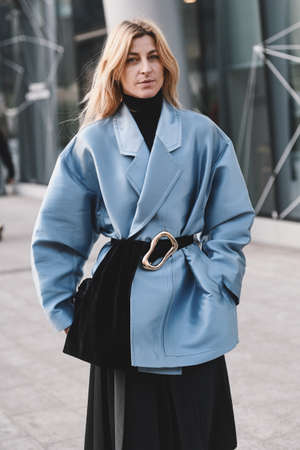Milan, Italy - February 20, 2019: Street style outfit before a fashion show during Milan Fashion Week  - MFWFW19のeditorial素材