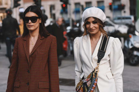 Milan, Italy - February 20, 2019: Street style outfits - models, bloggers and influencers before a fashion show during Milan Fashion Week - MFWFW19のeditorial素材