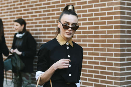 Milan, Italy - February 21, 2019: Street style â€“ Look after a fashion show during Milan...