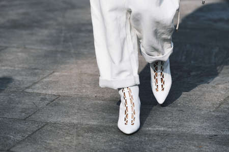 Milan, Italy - February 21, 2019: Street style â Boots detail before a fashion show during Milan Fashion Week - MFWFW19のeditorial素材