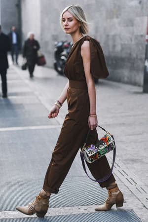 Milan, Italy - February 21, 2019: Street style â Fashion blogger Lisa Hahnbuck wearing a Fendi purse before a fashion show during Milan Fashion Week - MFWFW19のeditorial素材