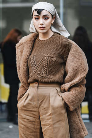 Milan, Italy - February 21, 2019: Street style â€“ Outfit before a fashion show during Milan...
