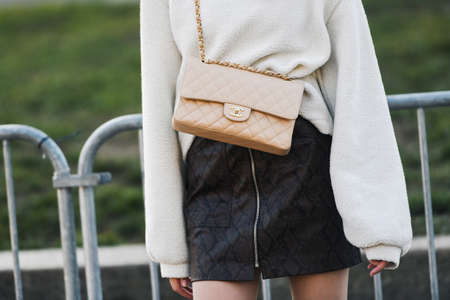 Milan, Italy - February 22, 2019: Street style outfit - models, bloggers and influencers before a fashion show during Milan Fashion Week - MFWFW19のeditorial素材