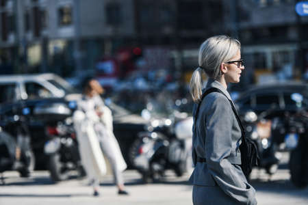 Milan, Italy - February 22, 2019: Street style outfit - models, bloggers and influencers before a fashion show during Milan Fashion Week - MFWFW19のeditorial素材