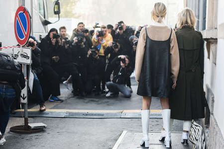 Milan, Italy - February 22, 2019: Street style â Street style photographers during Milan Fashion Week - MFWFW19のeditorial素材