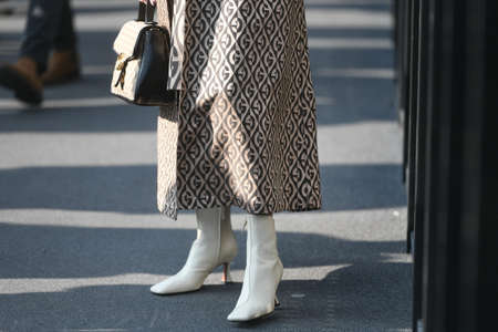 Milan, Italy - February 19, 2020: Street style detail - accesories and clothingstreet style clothing...