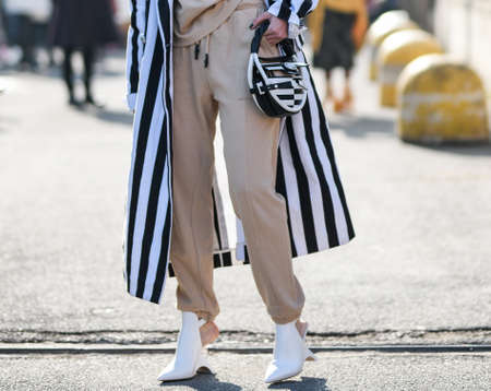 Milan, Italy - February 19, 2020: Street style outfit - streetstylefw20